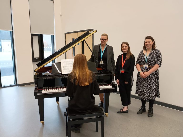 Taylor Wimpey East Anglia Donates £7,000 for Baby Grand Piano at Cambourne Village College